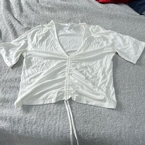 Never worn- women’s tie/ pull top- size- large